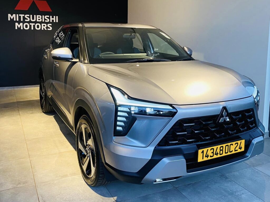 Liberta Car Rental Mauritius – Mitsubishi Outlander SUV available for hire, parked by a tropical coastline