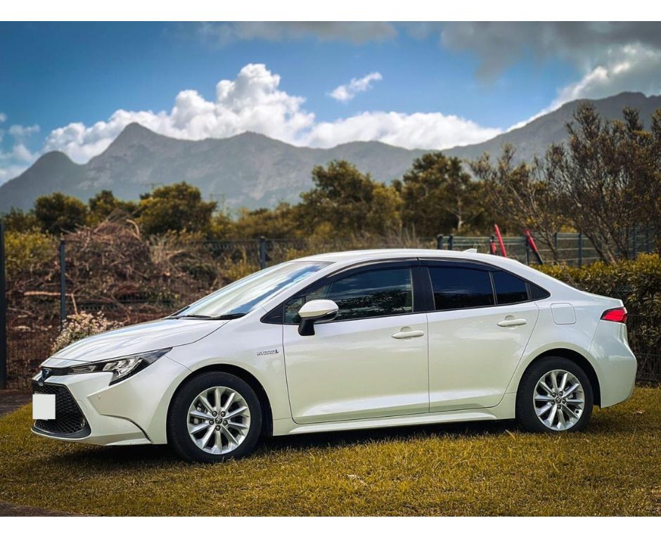 Cheap car hire Mauritius, affordable economy car on scenic coastal road