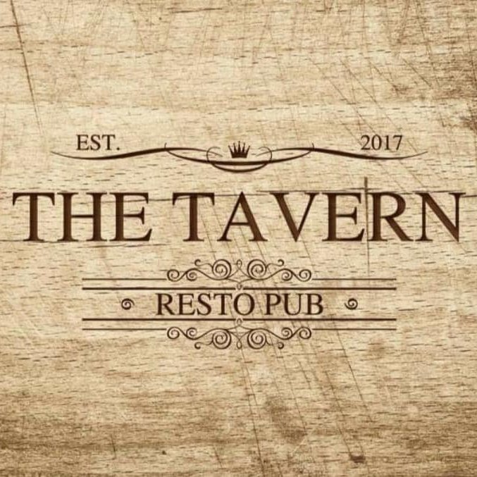 Nightlife in Grand Baie at The Tavern Resto Pub with neon lights on Coastal Road, Mauritius.